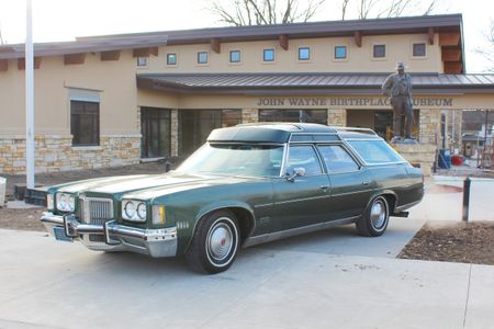 John Wayne's dark-green 1971 Pontiac station wagon.  