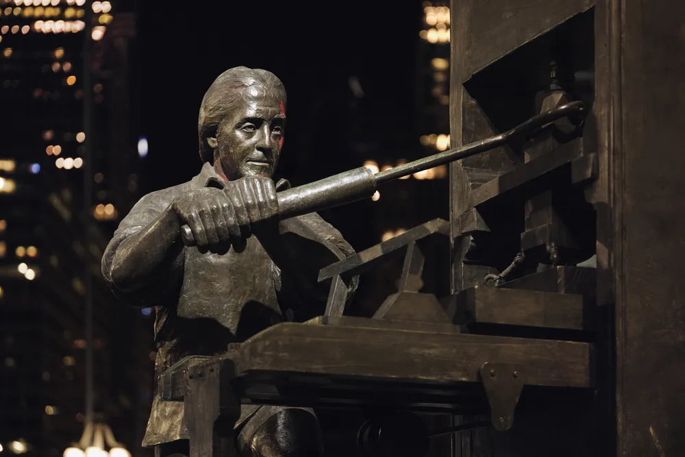 OPENER - Looming large on Philadelphia’s Broad Street, a ten-foot-high statue—a gift to the city from the Pennsylvania Freemasons—shows young Benjamin Franklin at his printing press.