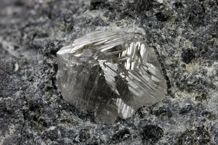 Diamond crystal on kimberlite from Eastern Siberia