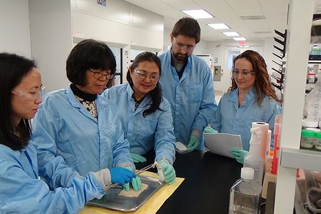 Acelity scientists evaluate a new prototype at the company's Regenerative Medicine Laboratory in Bridgewater, New Jersey.