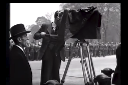 A cameraman at the coronation of King George V.