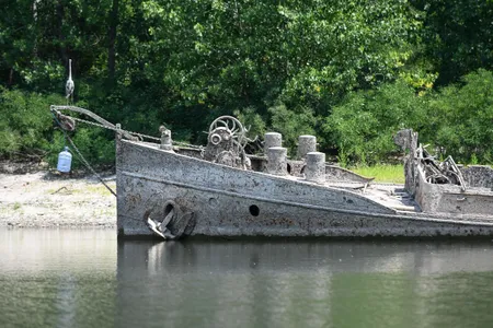 In June, a World War II barge became visible in the Po River