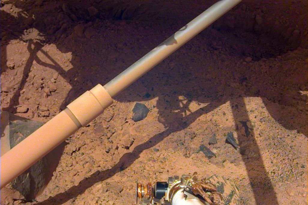Small pits on Mars' surface excavated by InSight
