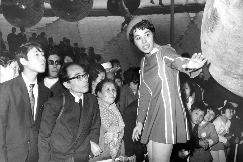 Beverly Gray at a 1970 expo in Japan explaining a spacecraft