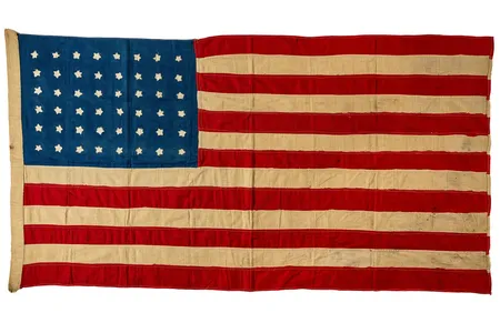 Using the encyclopedia as a guide, a group of Islay villagers worked through the night stitching together a Stars and Stripes.