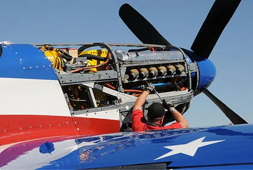 In the pits, crews work on systems and engines right up to the last minute. Miss America’s powerplant is a Packard-built Rolls Royce Merlin V-1650-7, modified to put out 3,000-horsepower.