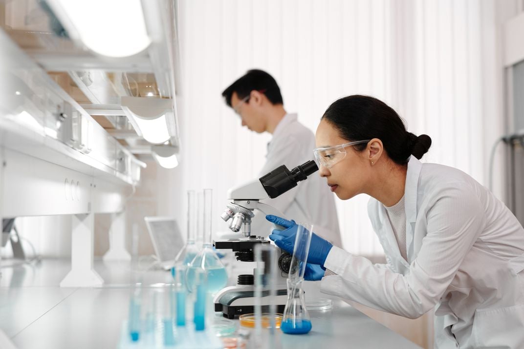 Two people working in a lab