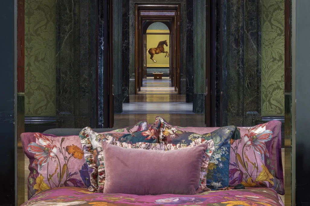 Plush bed inside an art museum