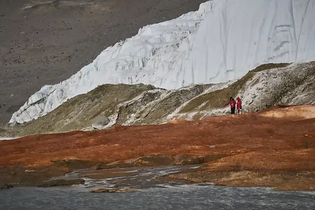 Researchers involved in the study collect samples at Blood Falls.