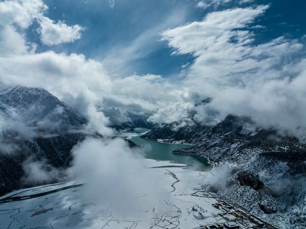 Ranwu Lake surrounded by blue sky and white clouds thumbnail