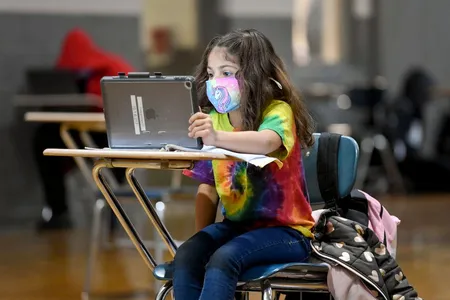 A student does her remote learning at a Boys and Girls Club in Reading, Pennsylvania.