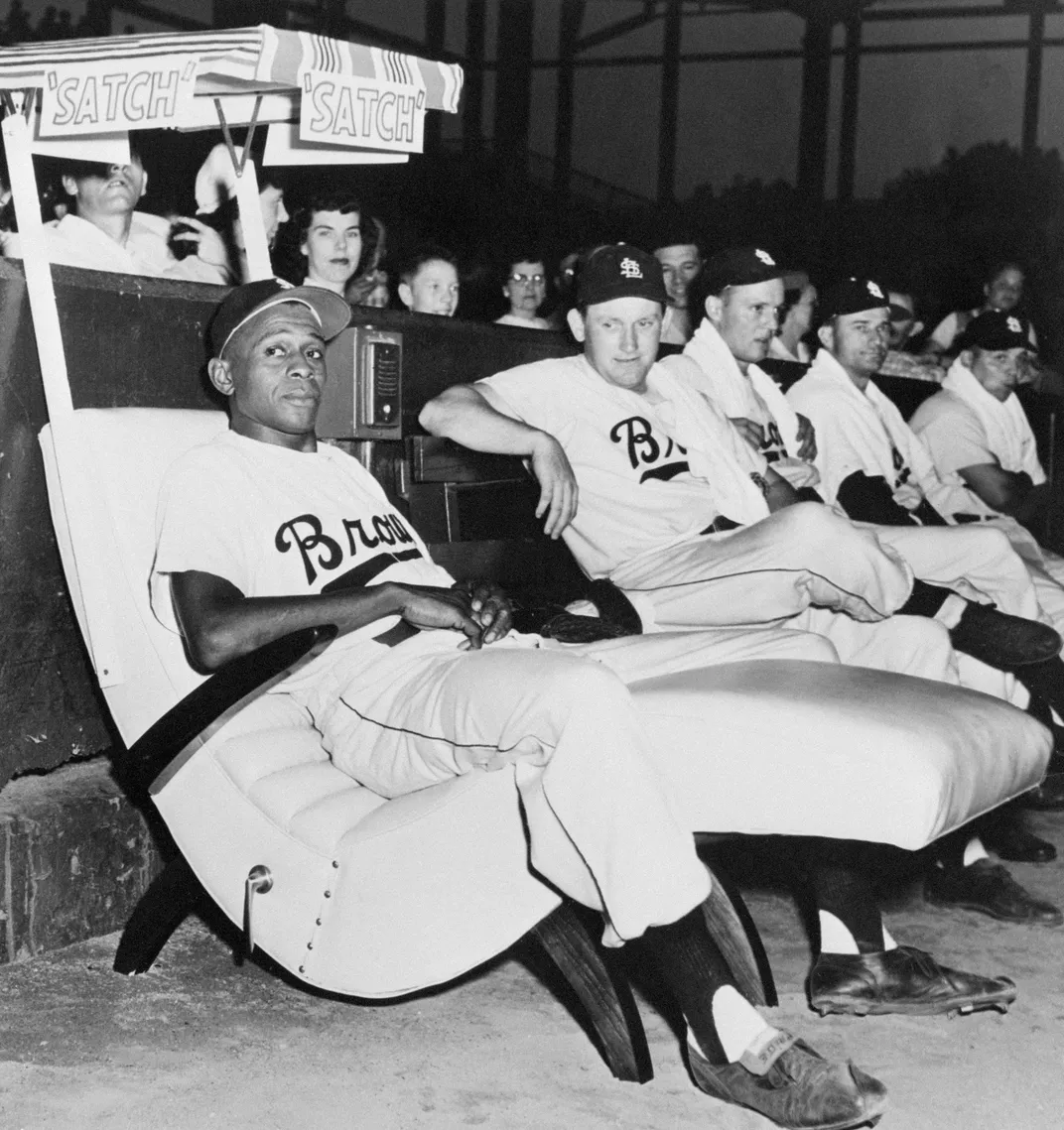 Satchel Paige sits in an easy chair