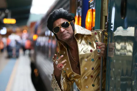 Elvis tribute artist Alfred Kaz, also known as 'Bollywood Elvis' poses at Central Station ahead of boarding the 'Elvis Express' on January 10, 2019 in Sydney, Australia.