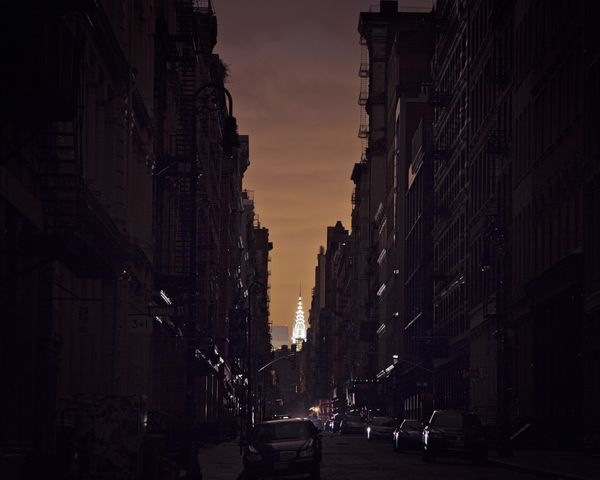 This is an image from my series The Day After, shot in Manhattan in the wake of Hurricane Sandy.  In this photo, the Chrysler Building shines in the distance while SOHO resides in darkness. thumbnail