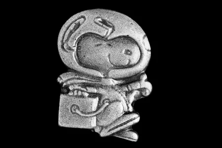 The Silver Snoopy pin, awarded to NASA astronauts and employees for "outstanding achievements related to human flight safety or mission success."