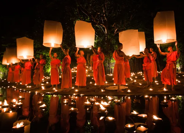 Monks releasing lanterns during Loy Krathong in Chiang Mai, Thailand. thumbnail