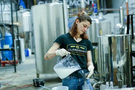 Sara Cartelli fills bottles with a hand sanitizer at the Claremont Distillery during the coronavirus pandemic on March 20, 2020 in Fairfield, New Jersey. Distillery owner Tim Koether will offer it to the general public for free.
