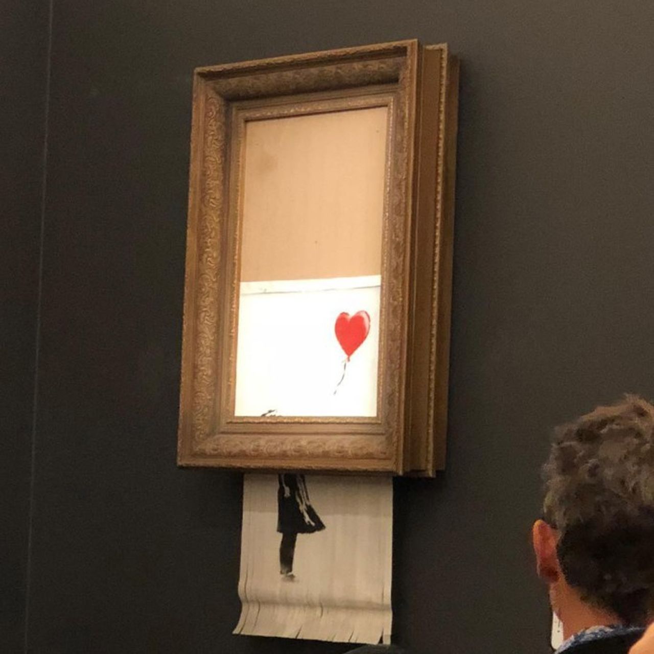 Watch This $1.4 Million Banksy Painting Shred Itself As Soon As