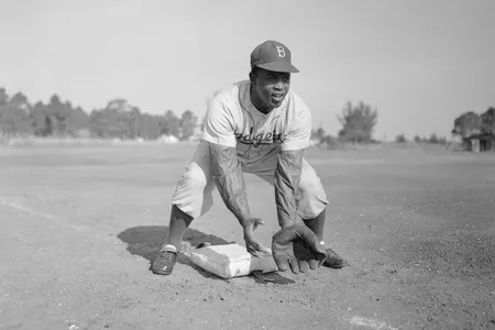 Jackie Robinson was the first Black athlete to play in modern Major League Baseball.