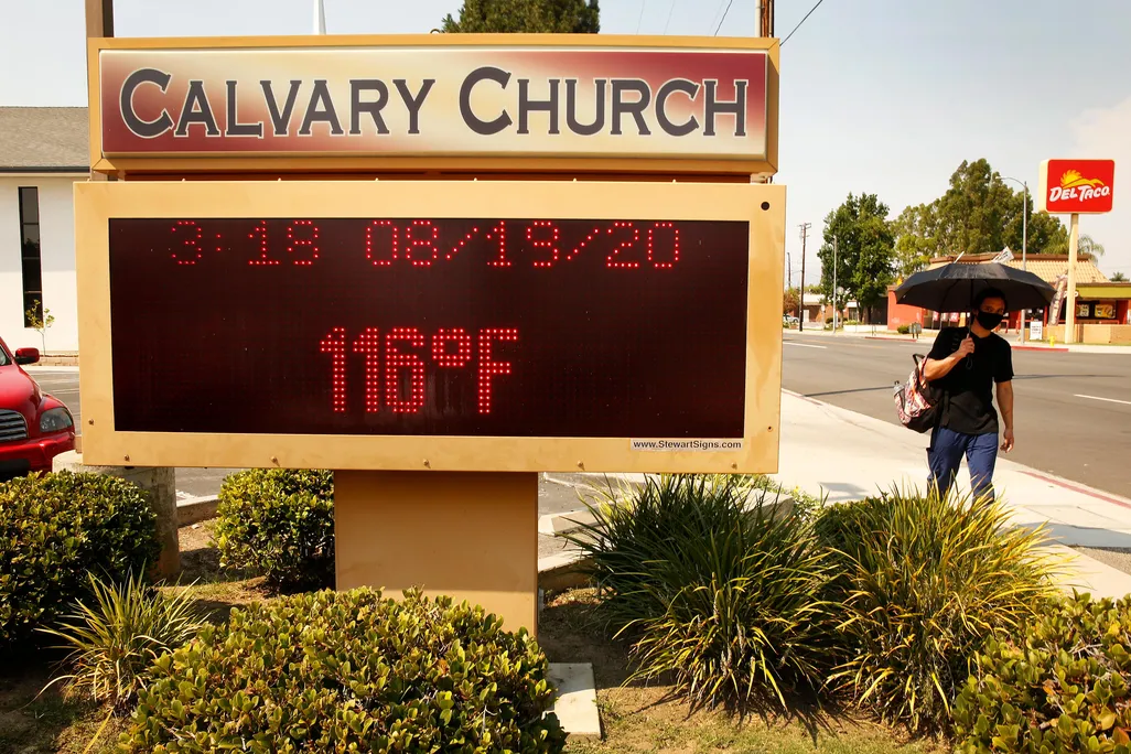 A digital Calvary Church sign in Woodland Hills displays the temperature at 3:18 p.m. on 8/18/2020 as 116 degrees Fahrenheit