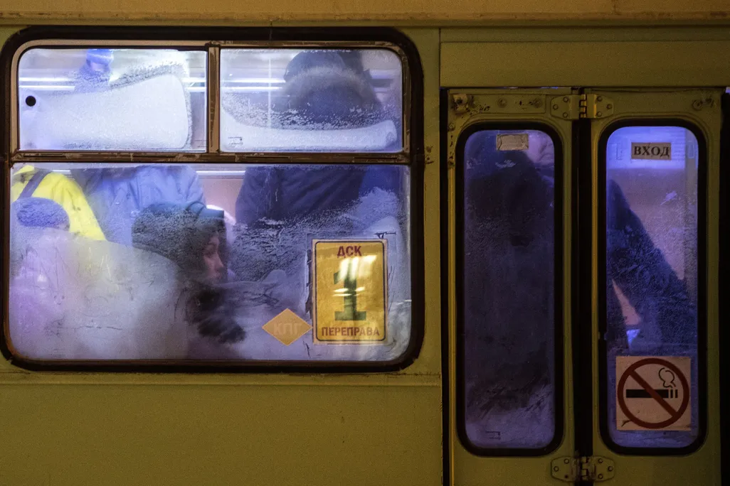 Commuters behind frozen bus windows in Yakutsk