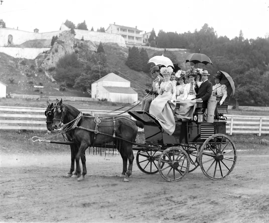 A horse-drawn carriage on Mackinac Island in 1887