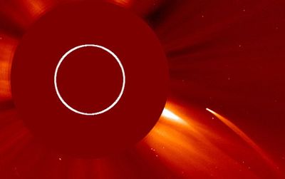 The C/2011 N3 comet is caught on a coronagraph, an image that blocks out the sun to reveal its corona.