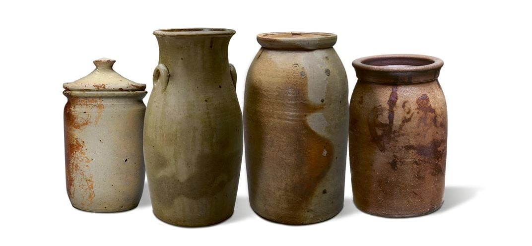 four glazed pots