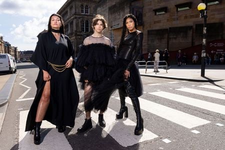 Models Shannon Summers, Joshua Cairns and Grace Dempsey arrive at the National Museum of Scotland ahead of the opening of &quot;Beyond the Little Black Dress.&quot;