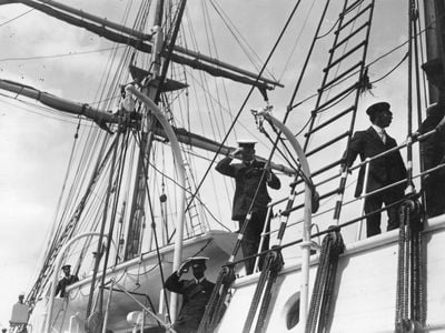 Ernest Shackleton salutes from the Endurance&nbsp;on August 1, 1914, when the ship set sail from London on the Imperial Trans-Antarctic Expedition.