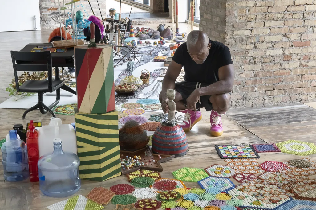 Cave in his studio with objects included in A Lit History.jpg
