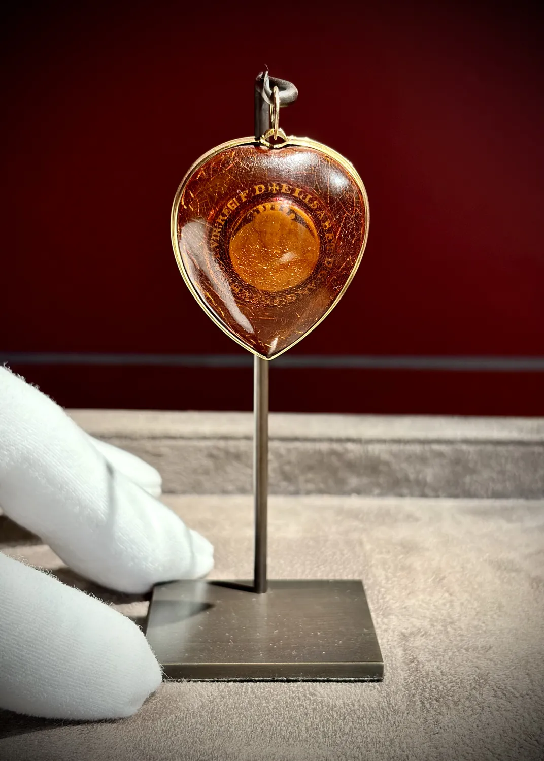 The portrait of Elizabeth was carved into a gemstone, likely white amber.