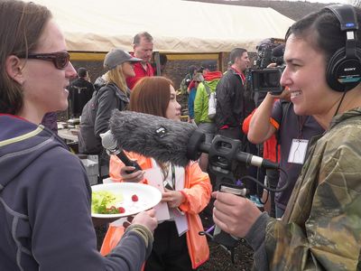 Carmel Johnston (left), crew commander, enjoys her first meal outside the dome.