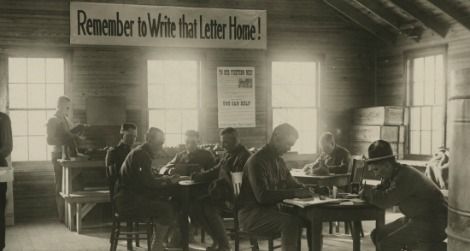 World War I soldiers writing letters home