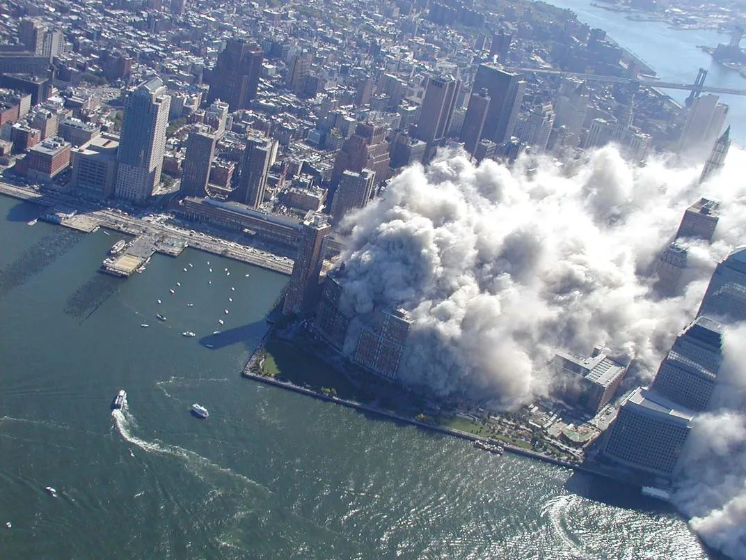 image of NYC and river with a smoke cloud over Manhattan