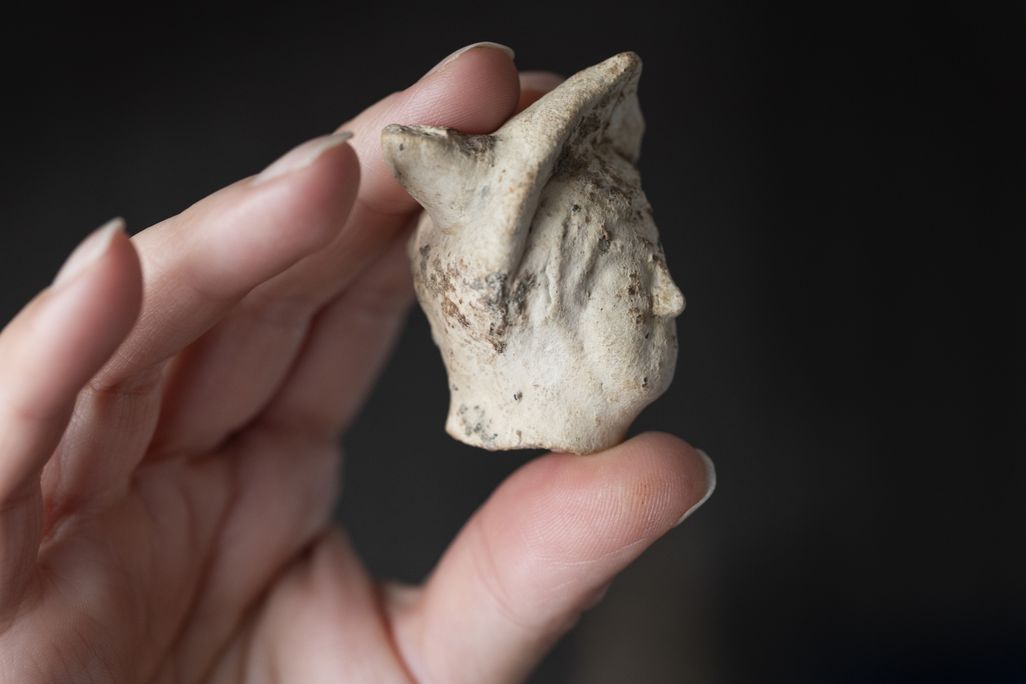 Clay head of Mercury