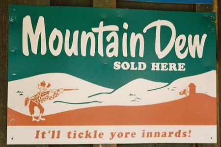 A 1950s Mountain Dew ad as photographed in Jakes Corner, Arizona
