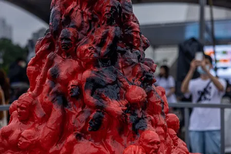 A replica of Pillar of Shame on display in Taipei, Taiwan, on June 4, 2023. Copies of the sculpture exist around the world.