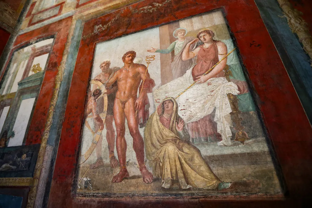 One of the stunning frescoes on the wall of the ancient home