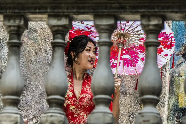 Girl with pink umbrella. thumbnail