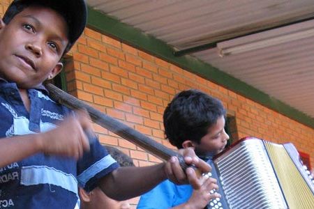 Students perform together at the vallenato music academy