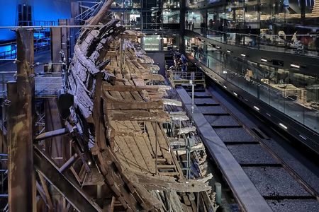 Metal sulfides left behind by anaerobic bacteria and the breakdown of iron artifacts were sopped by the wood while the ship was submerged.