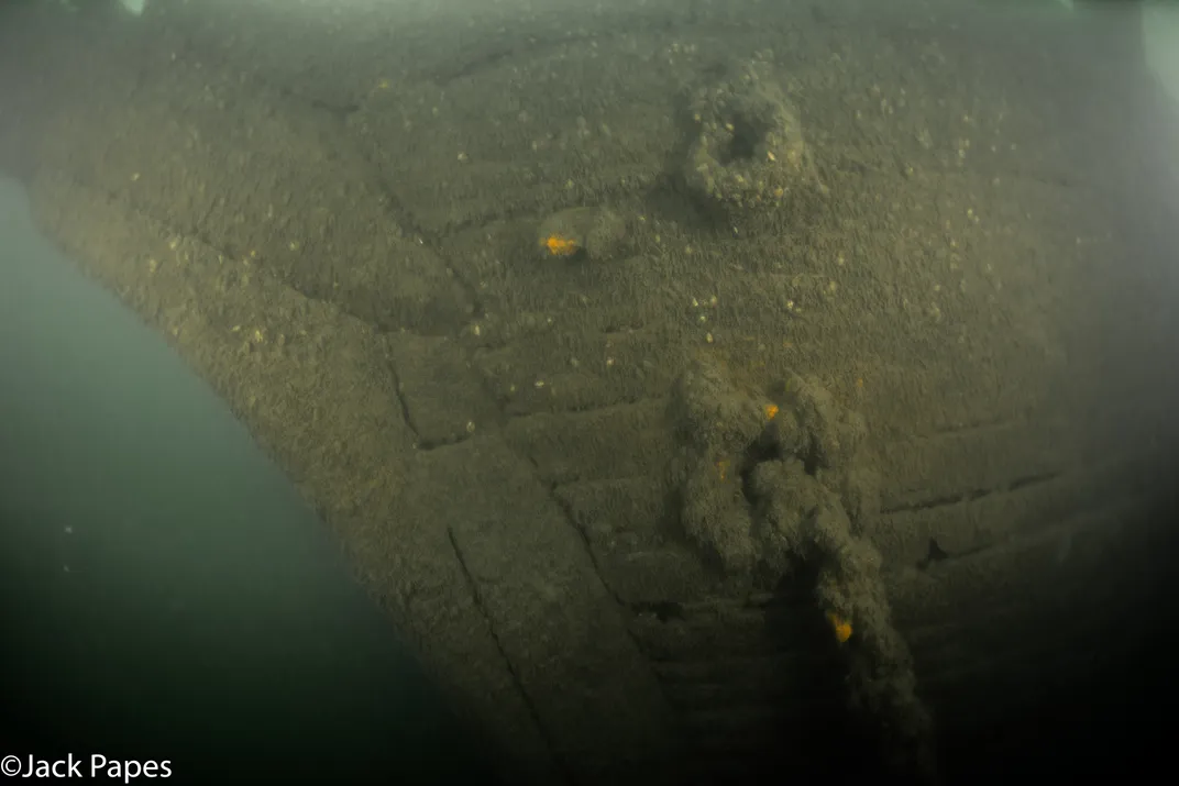 Up-close shot of a ship under water