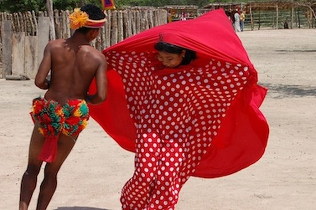 Two Wayuu dancers from La Guajira Province in northern Colombia perform a courtship dance.