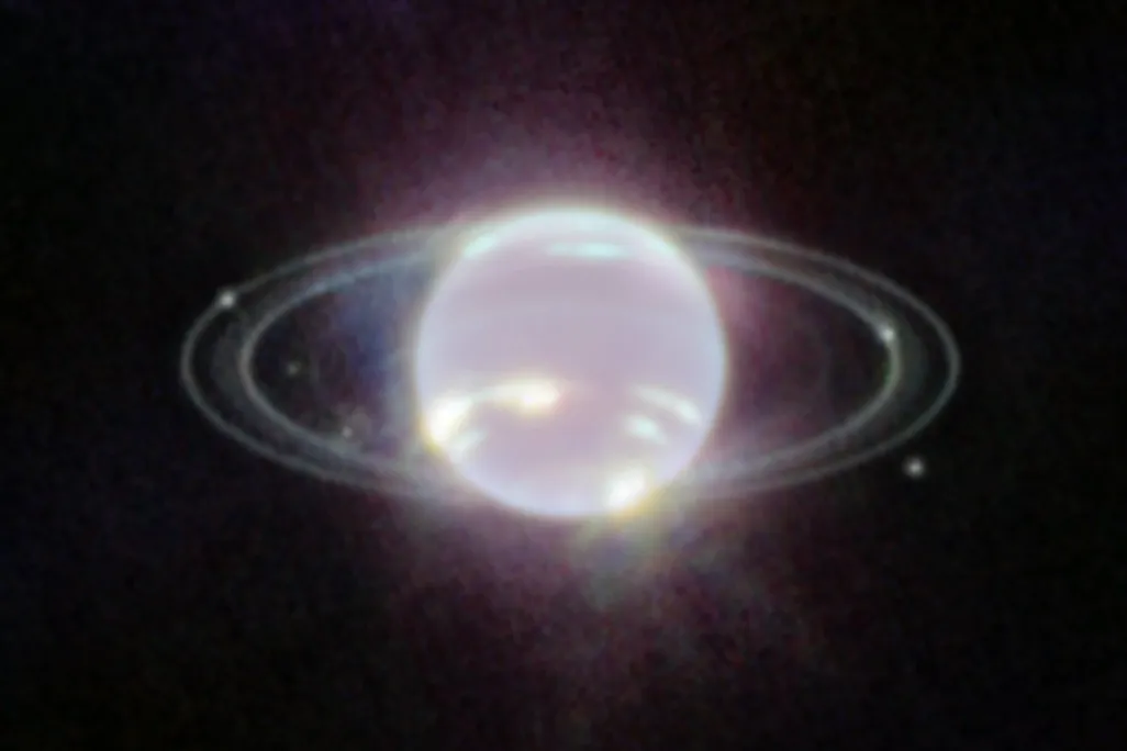Neptune surrounded by its rings and seven of its moons