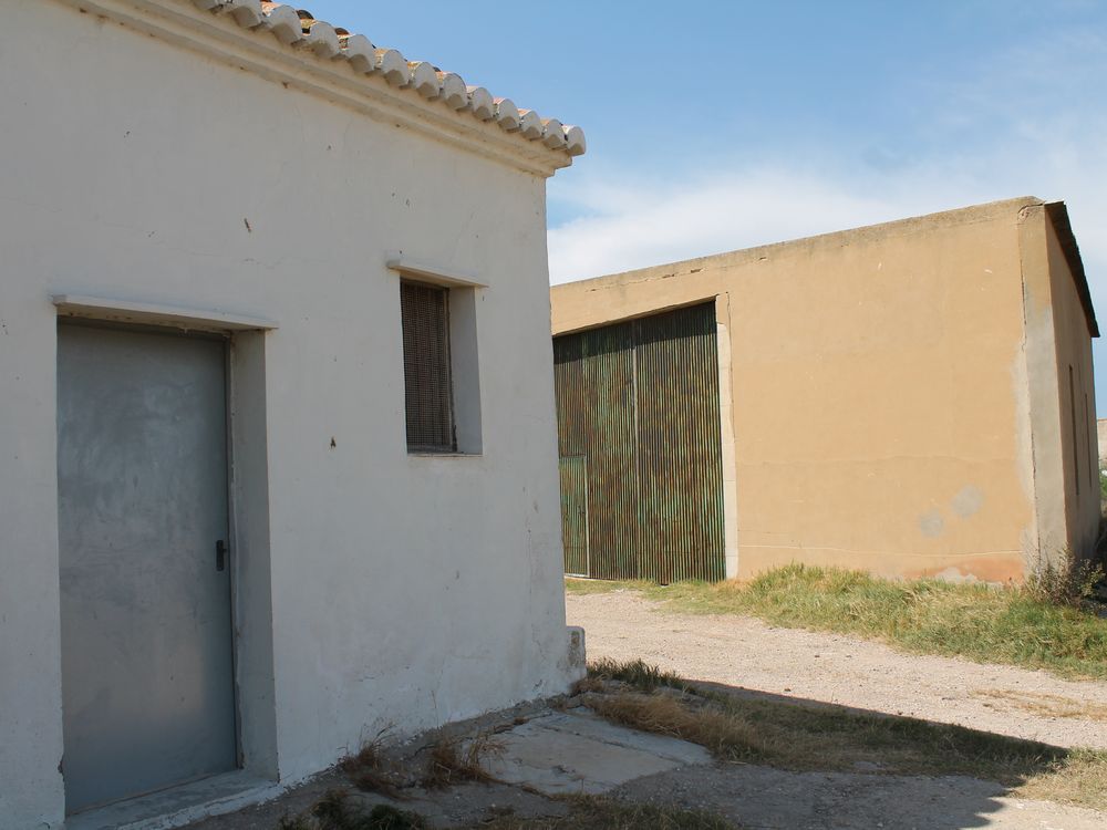 Homes and storage buildings in rice fields | Smithsonian Photo Contest ...