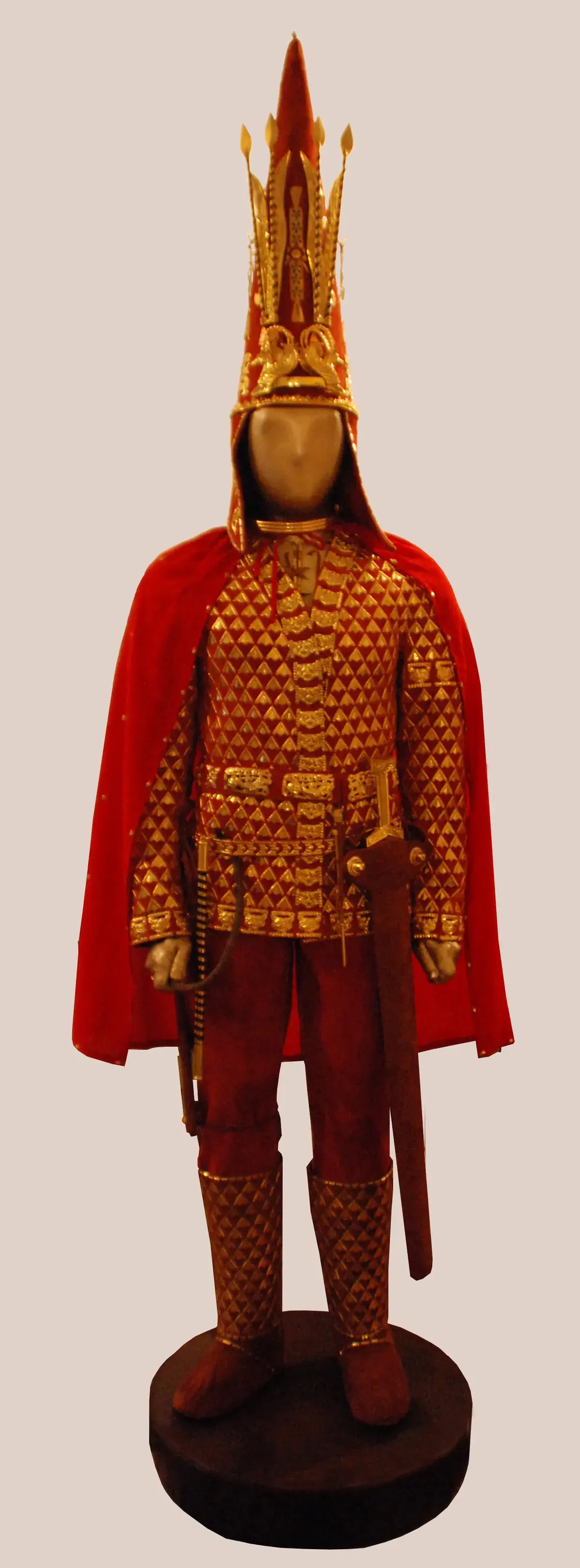 a fancy gold-and-red figure