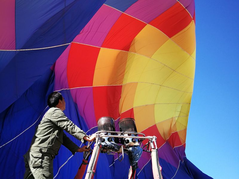 Deflating a hot air balloon in southwest China Smithsonian Photo