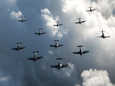 As many as 35 Corsairs still fly today, and 11 of them made it to the 2019 Thunder Over Michigan warbird show. Getting them all in one shot took the considerable talents of photographer Scott Slocum and photo ship pilot Bernie Vasquez. The Corsair legend is that it was too mean for the Navy so they gave it to the Marines. Here's the real story.