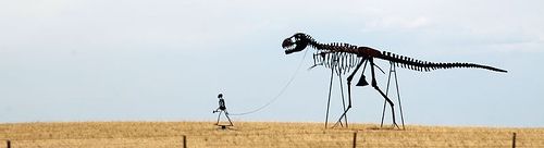 20110520083126caveman-skeleton-walk-dinosaur.jpg